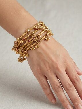 Gold Multi-Strand Beaded Bracelet with Ruby Accents